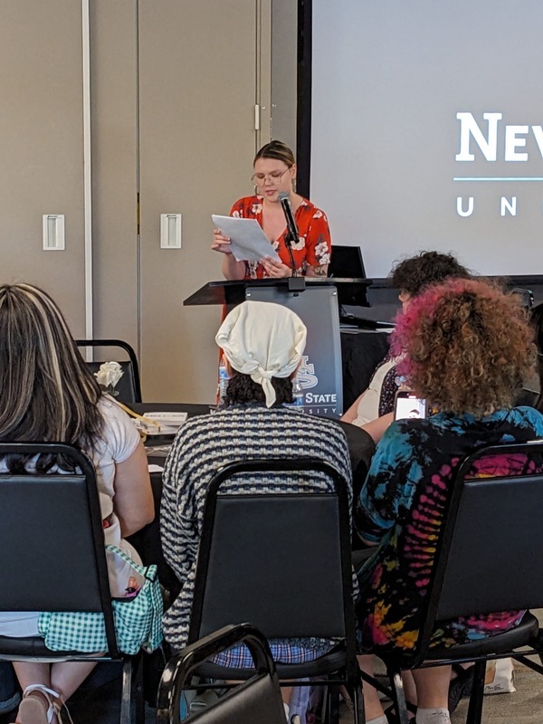 Ruby Burch presenting her thesis at the 2024 English Senior Showcase.