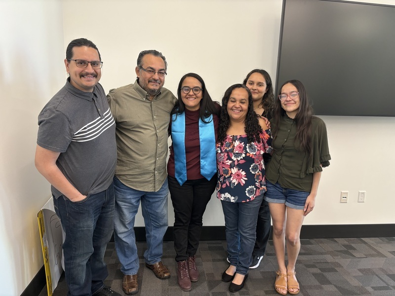 Monica Flores at her defense with her family