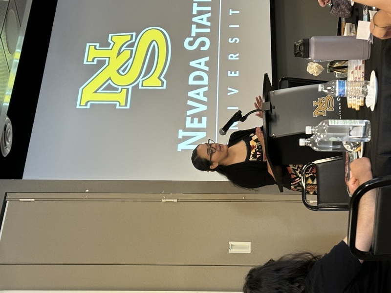 Monica Flores presenting her thesis